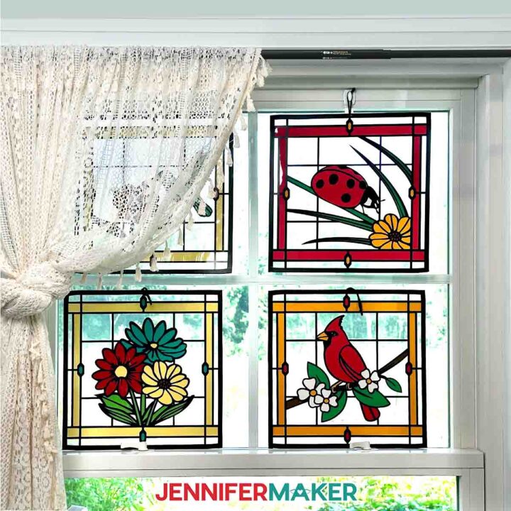 The ready-to-use stained glass designs are displayed in a window.
