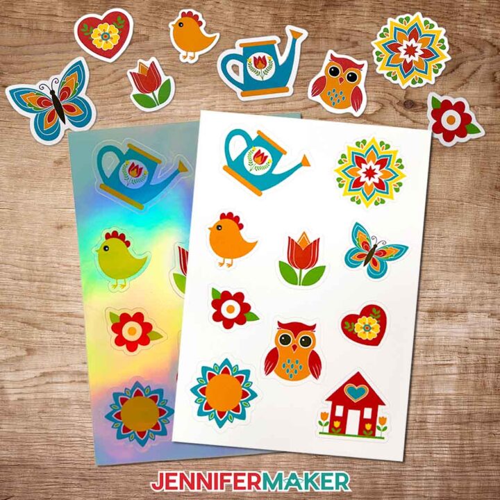 Sheets of stickers and die cut stickers made in Canva are laid out on a wooden table.