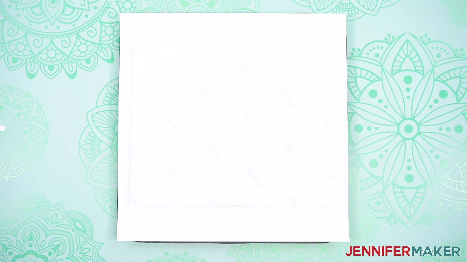 Turn your clock blank over and place it on the protected pressing pad so that the print is on top.