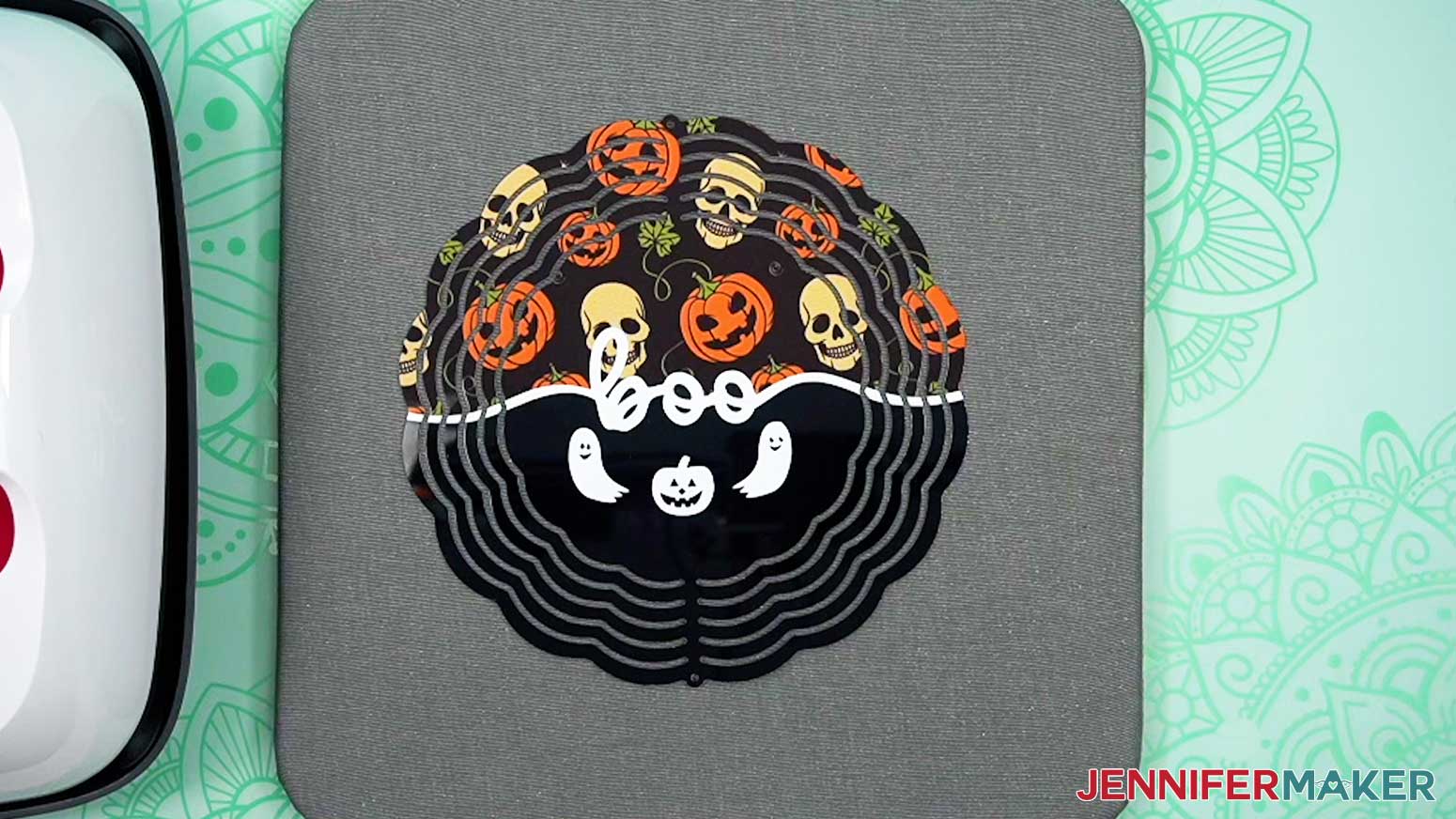 Remove the tape and infusible ink carrier sheet to reveal the design.