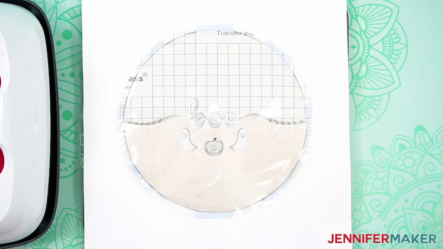 Remove the EasyPress and allow the infusible ink carrier sheet and wind spinner to cool.