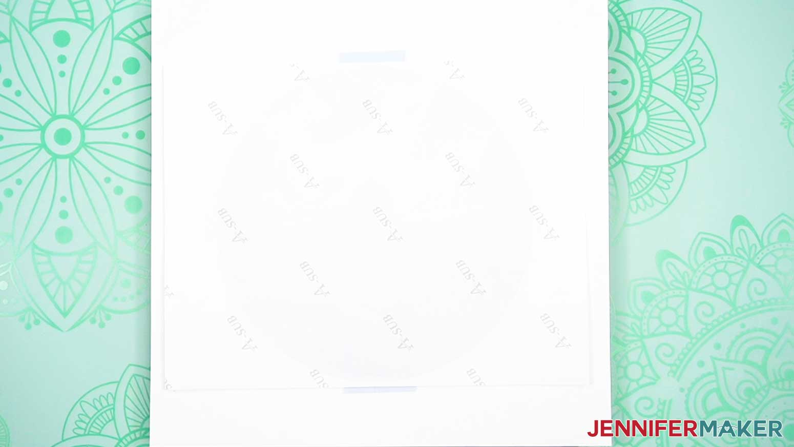Place the print face down over the wind spinner on the white cardstock and pressing mat.