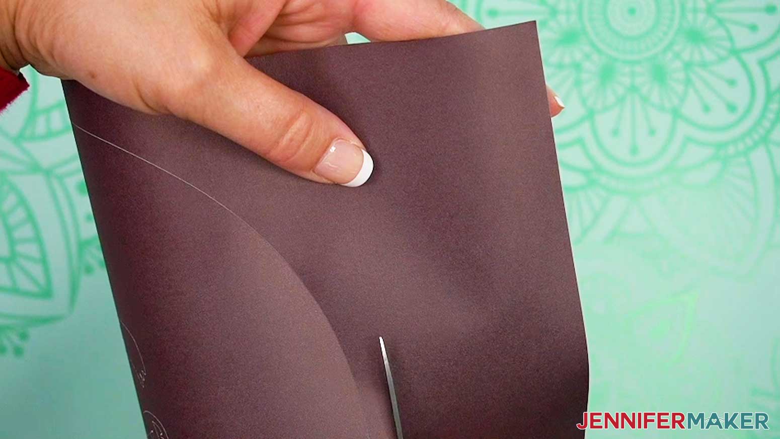 Use scissors to trim away excess infusible ink.