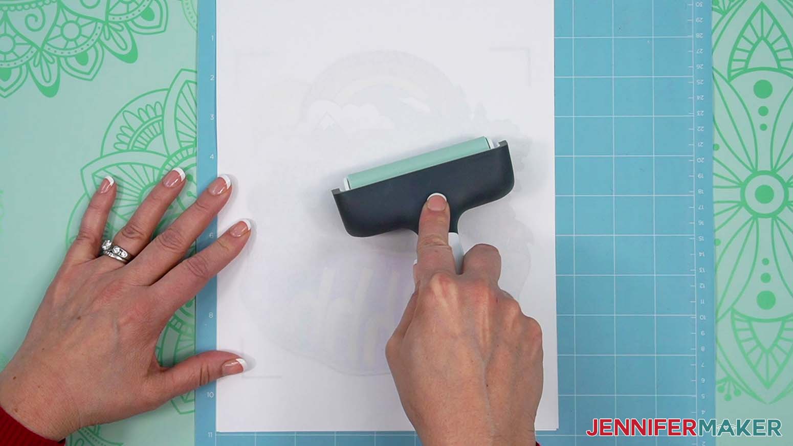 Lay a clean piece of printer paper over the top and use a brayer to adhere it well.