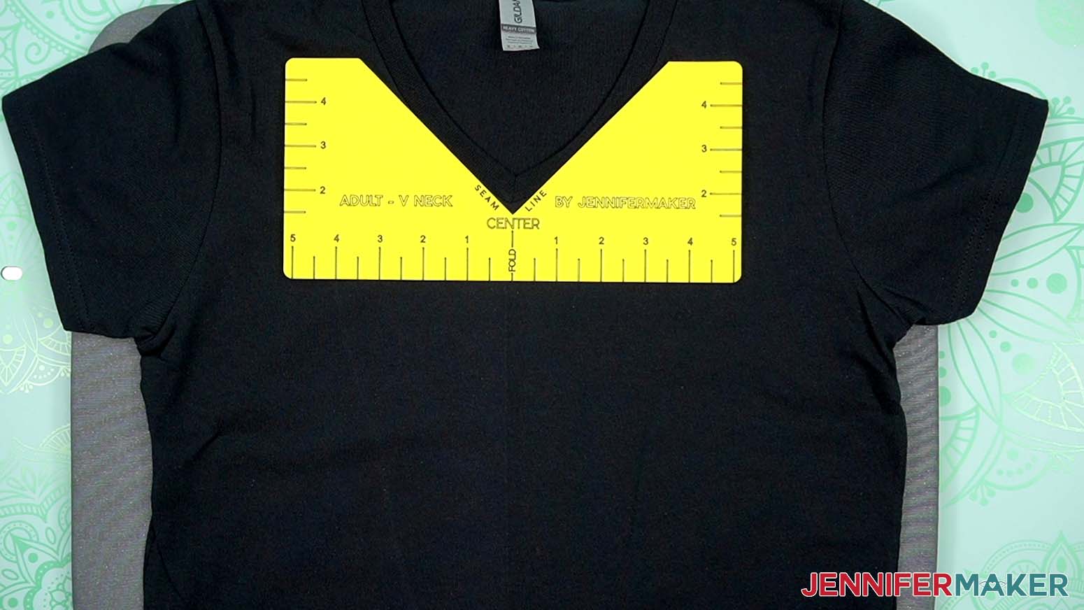 Then - if you're using one - line up the correct T-Shirt Ruler Guide's center line on the crease. Now your design will be placed in the standard spot for a T-shirt of this size and style.