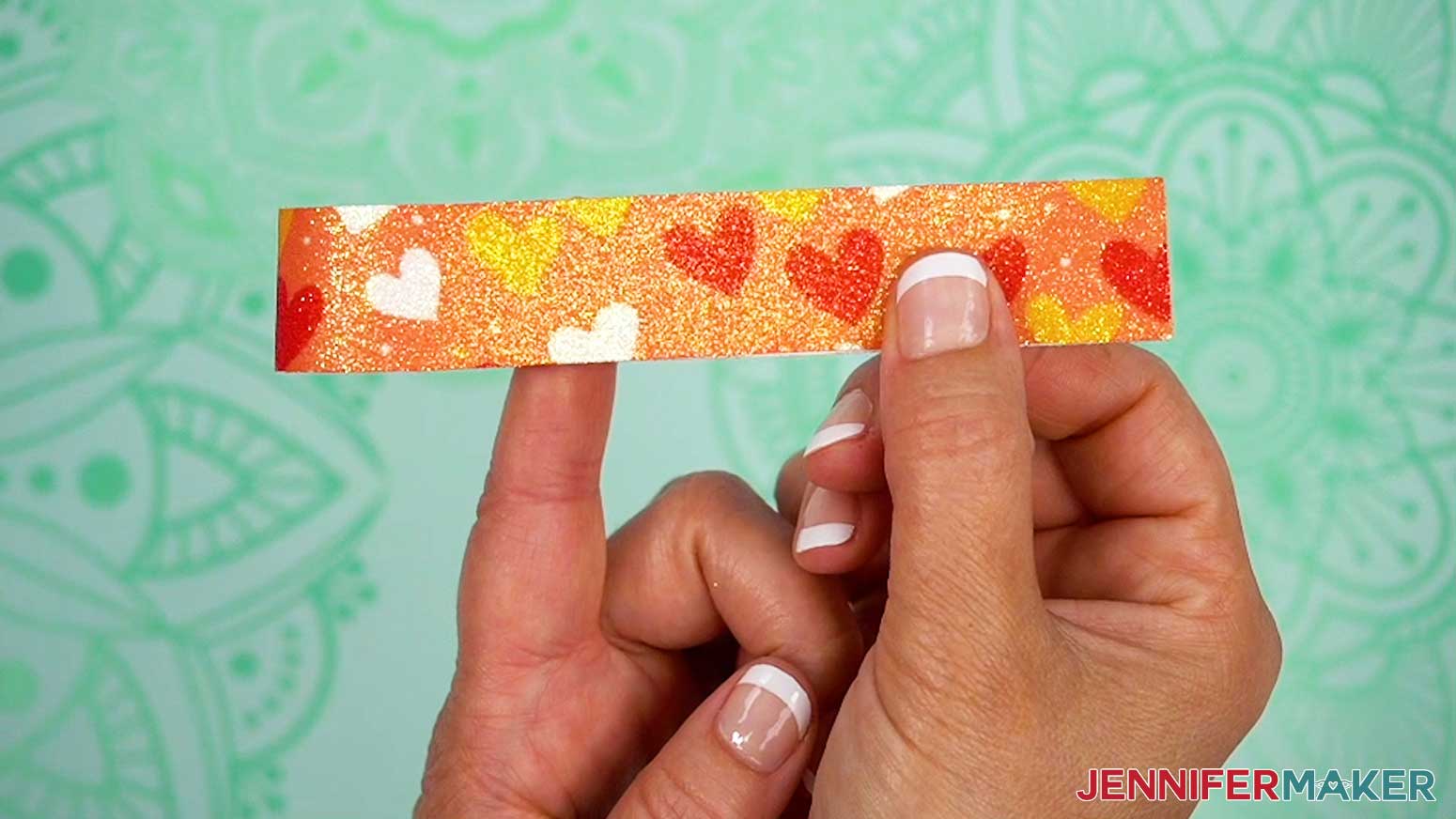 Fold the rectangle in half and join the edges.