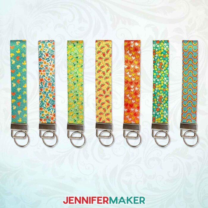 Learn how to Sublimate Faux Leather Accessories with JenniferMaker's tutorial! A collection of glittery sublimated wristlets with different cute patterns.