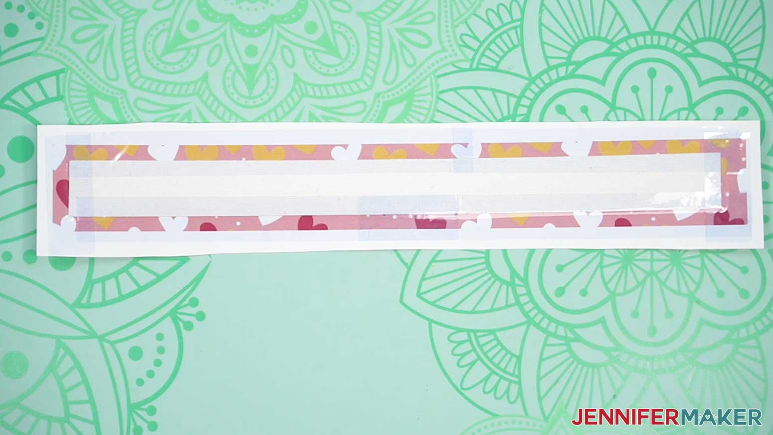 Use heat resistant tape to secure the leather to the sublimation print.