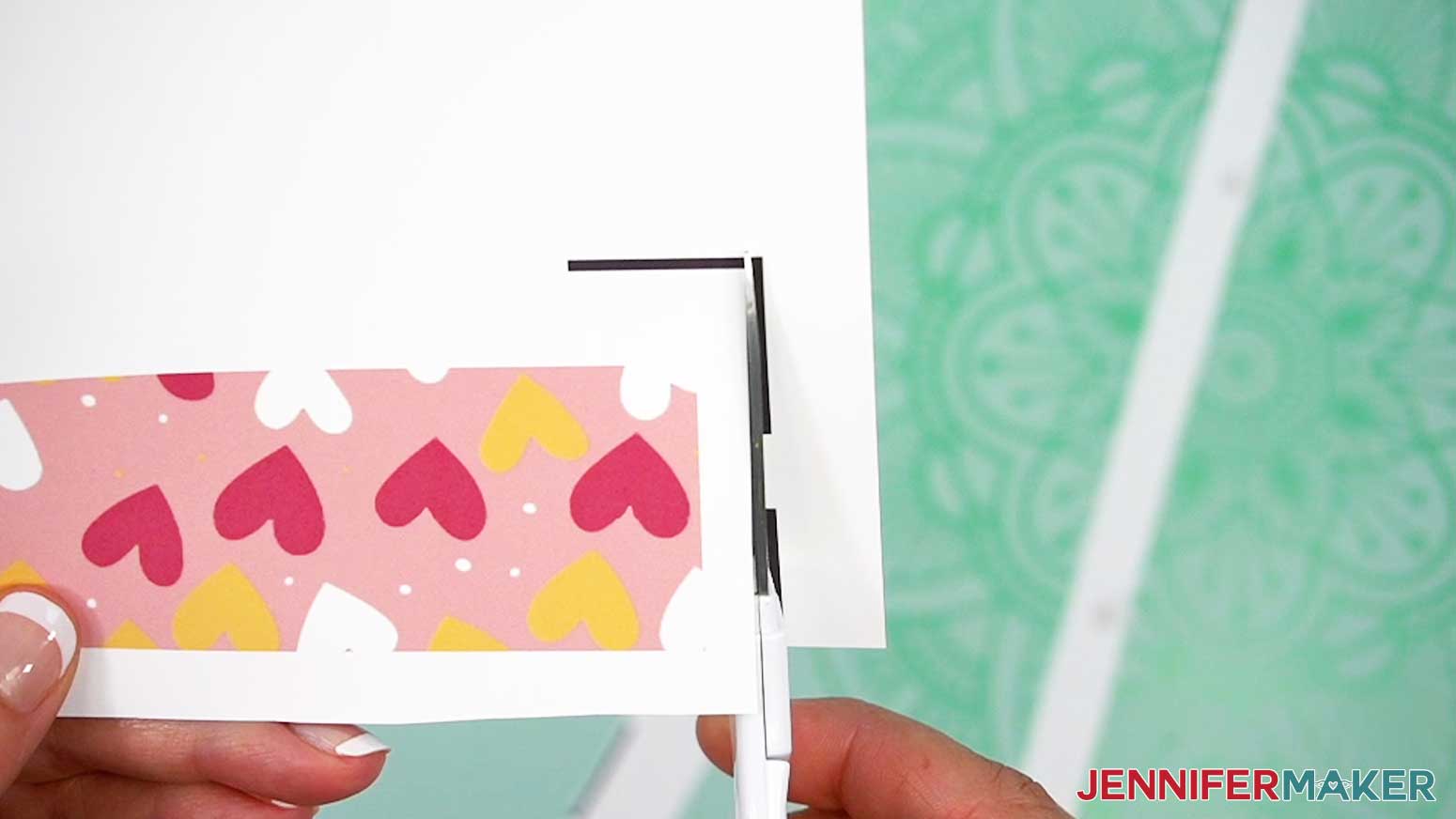 Trim away the registration marks that printed around the design on the sublimaton paper.