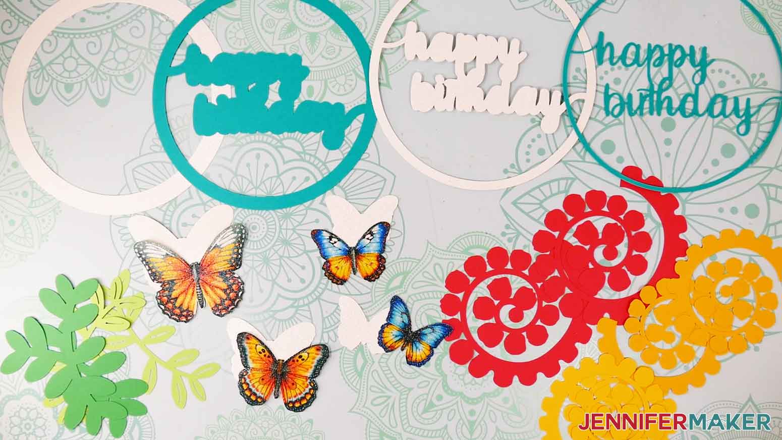 Display of all of the sublimated and cut pieces for the butterfly birthday cake topper.