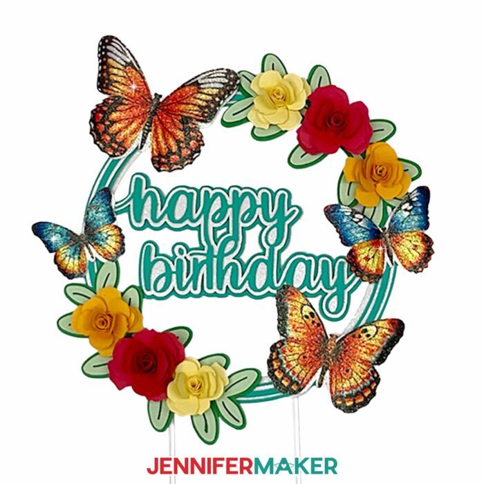 Decorative Happy Birthday topper with butterflies sublimated on glitter cardstock.