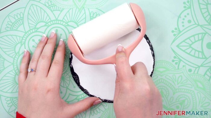 Use a lint roller to clean the surface of the sublimation slate prior to tape the image to it.