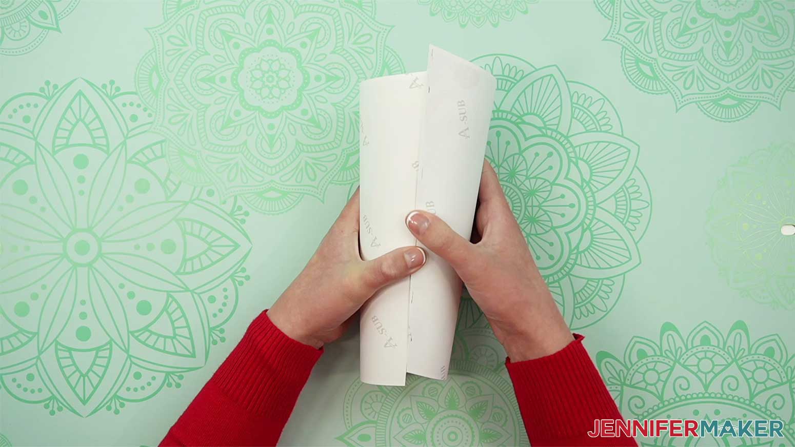Wrap the tumbler until the edges of the paper meet