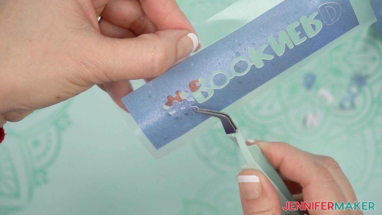 Use tweezers to help remove ve infusible ink pieces.