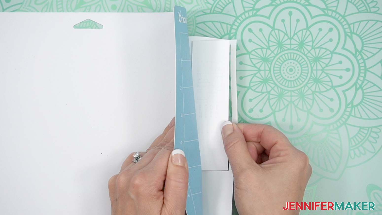 Flip your mat over and peel it away from the copy paper