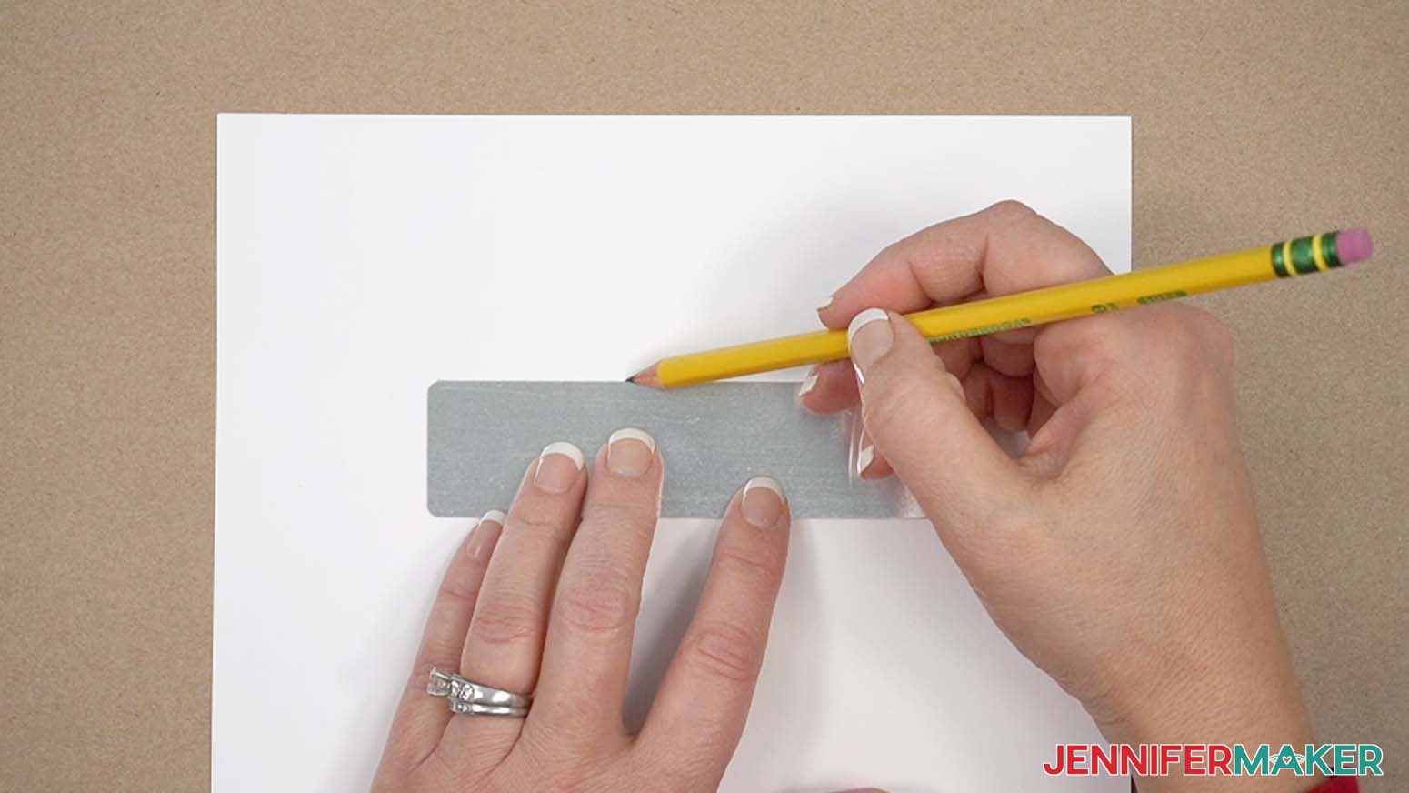 Trace the bookmark with a pencil on sublimation paper.