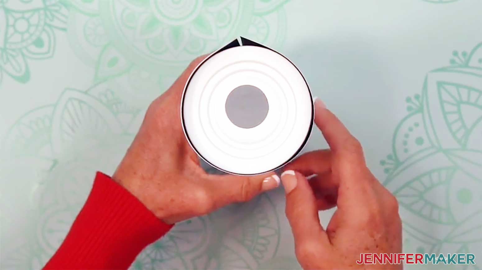 Align the edges of the print around the glow in the dark tumbler.