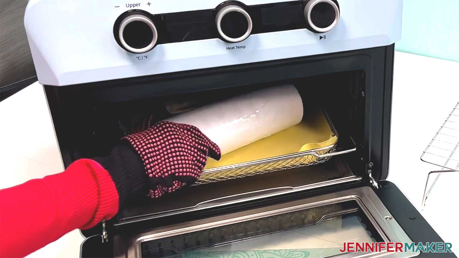 Place the prepared glow in the dark tumbler into the warmed sublimation oven.
