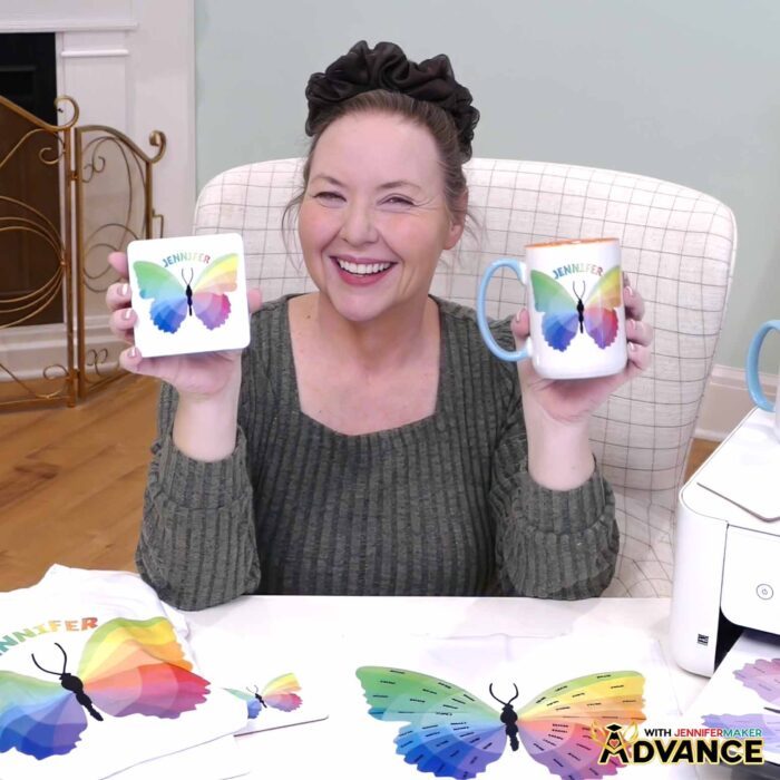 Jennifer holds up personalized versions of her Sublifly coaster and Sublifly mug.