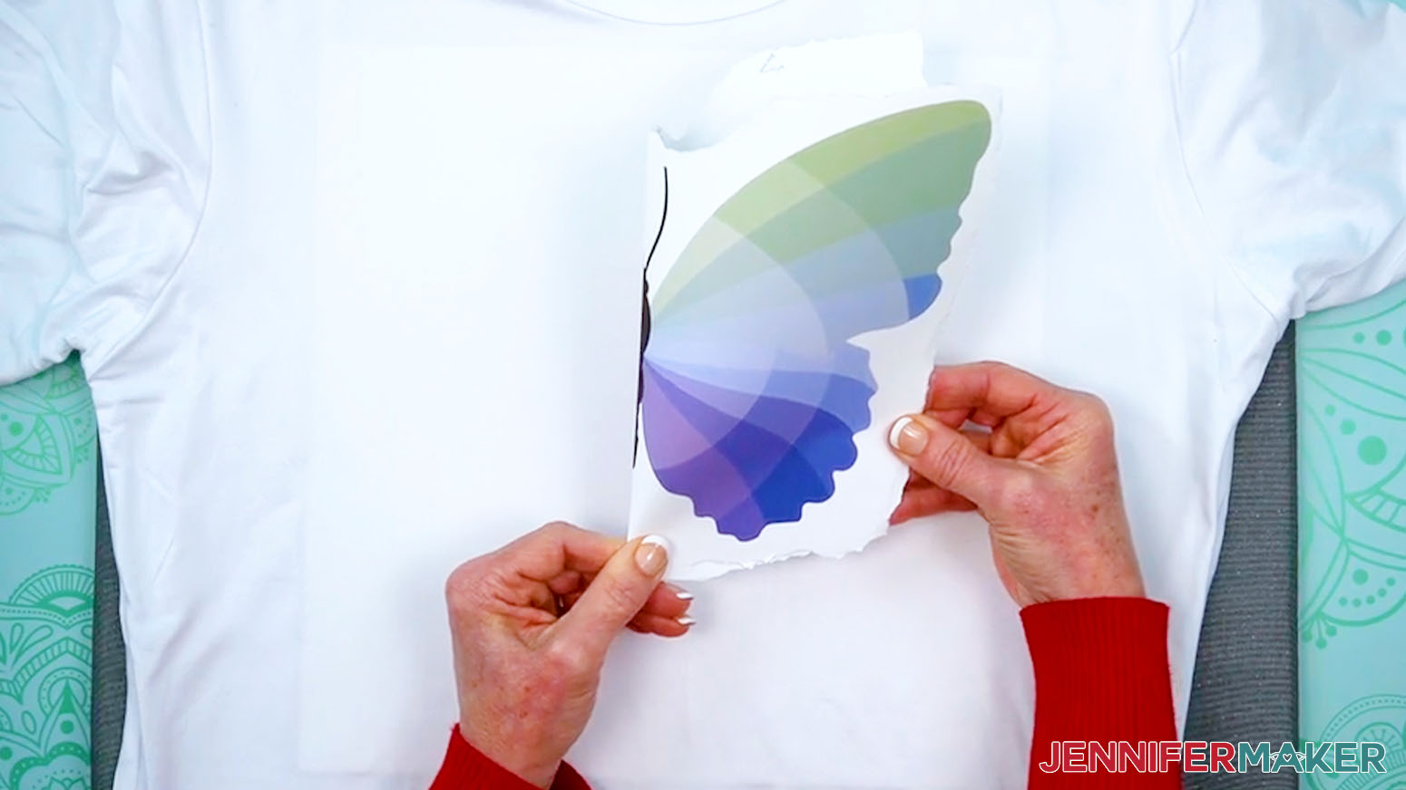 Fold the Sublimation Basics design in half and press a crease at the top and bottom to help with design placement.