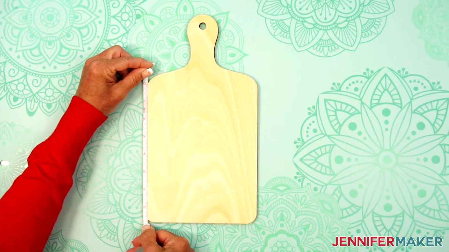 Measure the height of the sublimation design area of the charcuterie board.