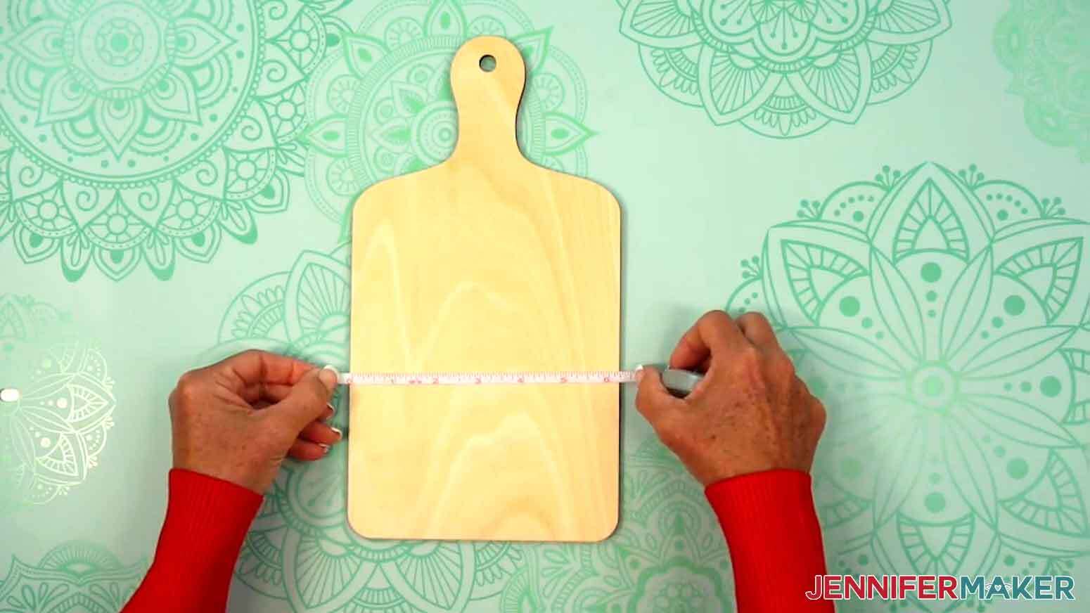 Measure the width of the sublimation charcuterie board on its base.
