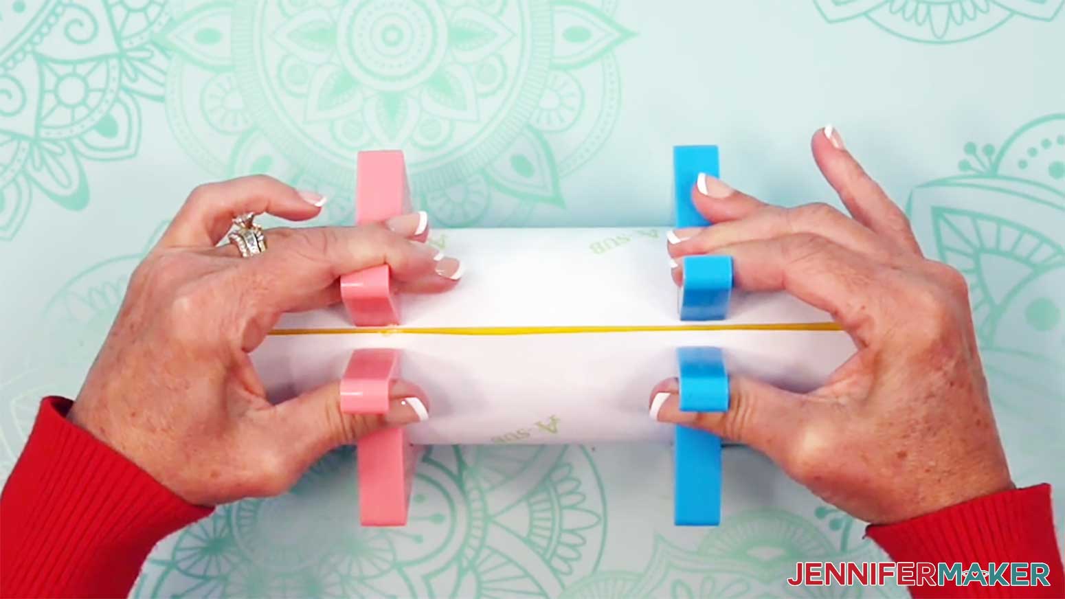 Use tumbler clamps to hold the glow in the dark tumbler reverse sublimation design against the tumbler.