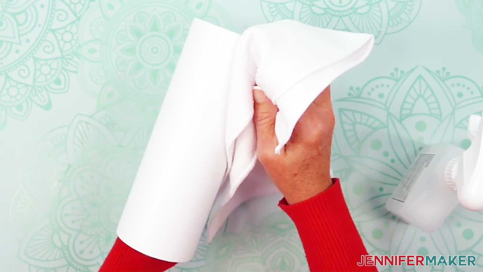 Clean the glow in the dark tumbler using alcohol and a lint free cloth.