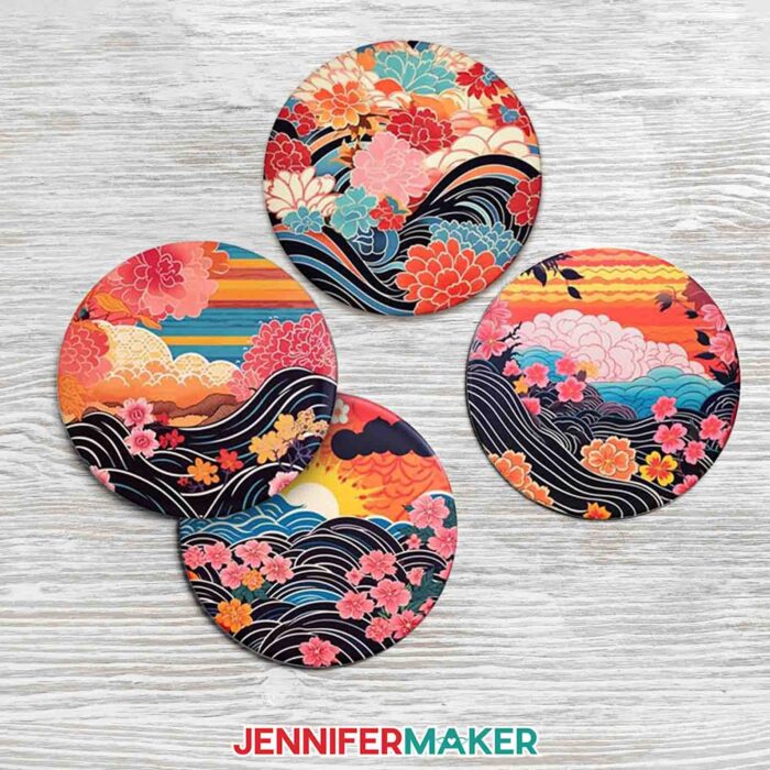 Get designs for 12 new Japanese art-inspired sublimation coasters in JenniferMaker's new blog! Four coasters sit on a whitewashed wood table.
