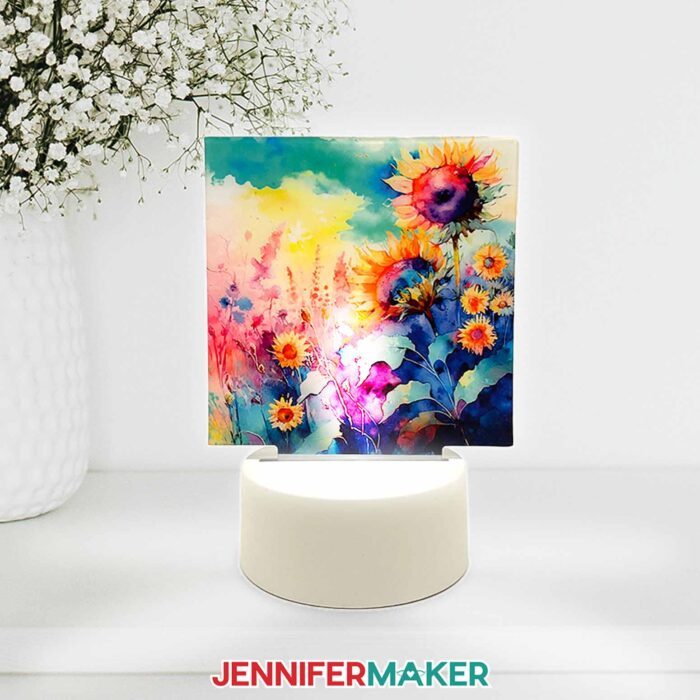 A nightlight with watercolor sunflowers using sublimation on acrylic.