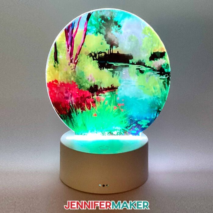 A round nightlight with watercolor landscape using sublimation on acrylic.