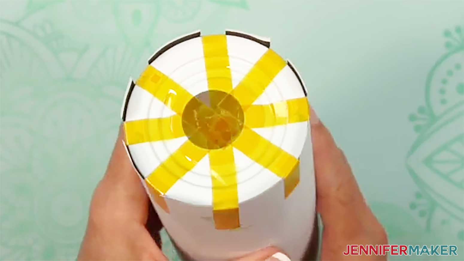 Eight pieces of tape now cross the bottom of the glow in the dark tumbler.