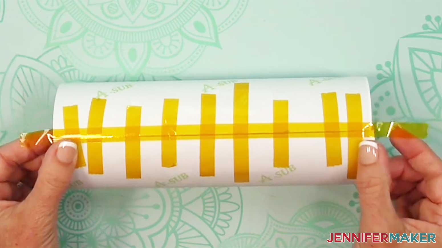 Place a long piece of tape down the entire seam of the glow in the dark tumbler reverse sublimation print.