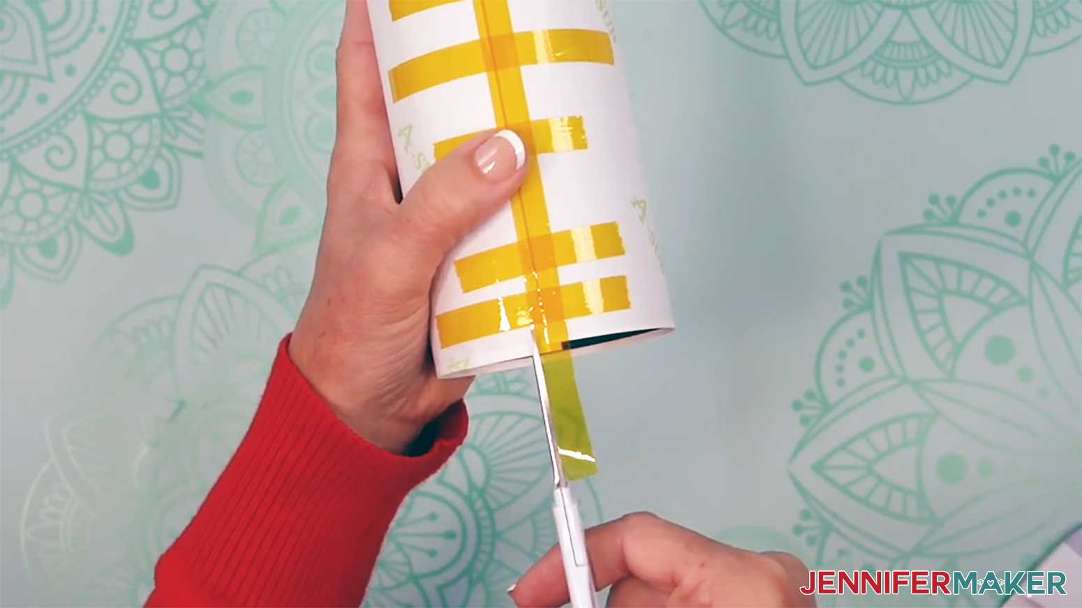 Trim the paper next to the tape on the end of the glow in the dark tumbler.