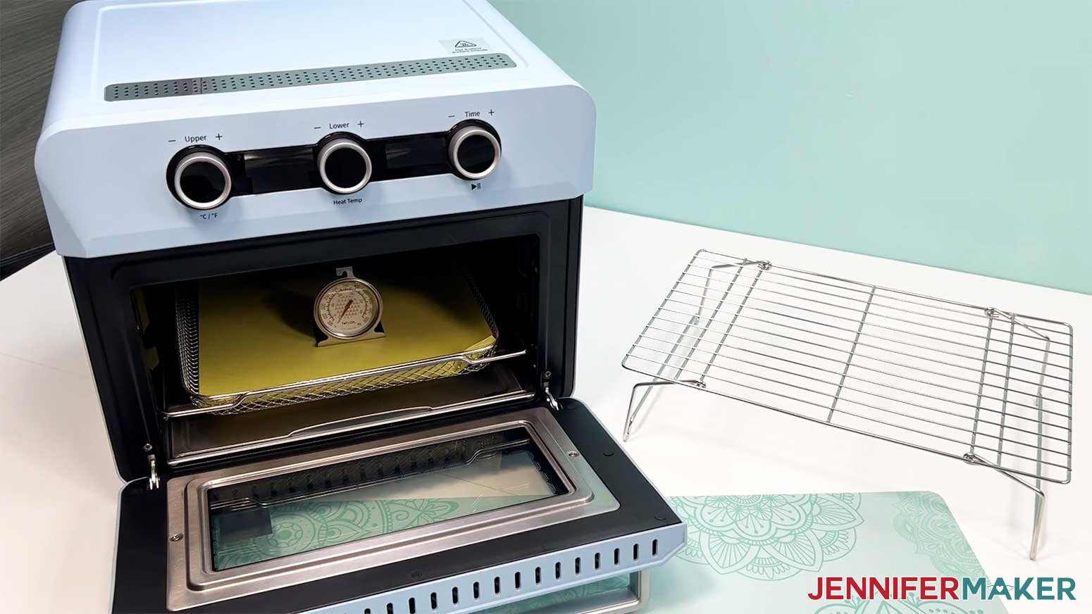 Place a thermometer in the oven to make sure the temperature is correct for the glow in the dark tumbler.