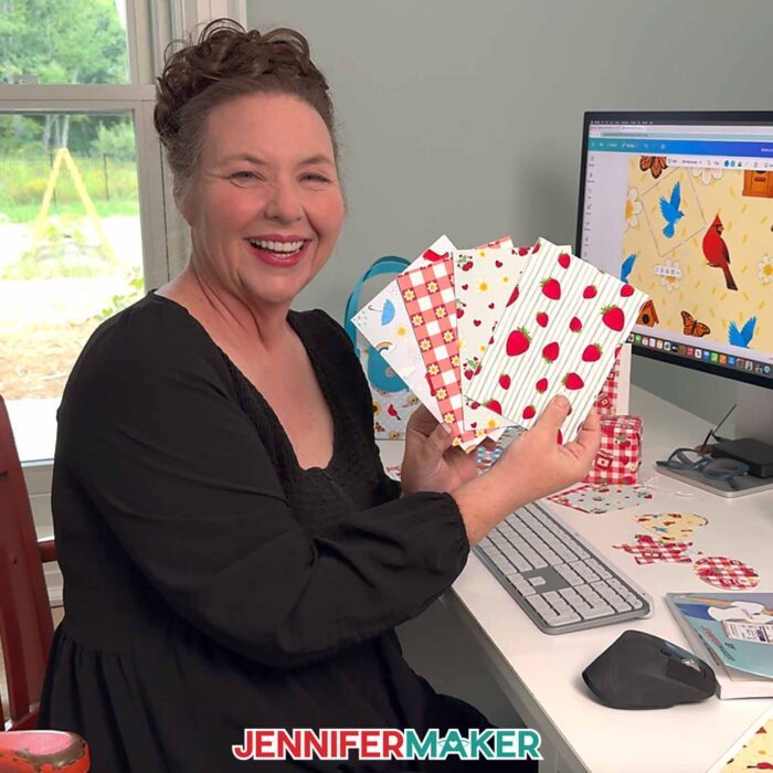 Jennifer Maker shows of a collection of coordinating paper she designed as part of her Seamless Pattern In Canva tutorial