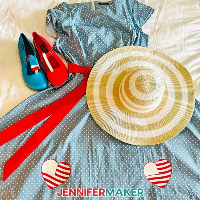 A blue and white polka dot dress with red and white vinyl striped hearts, a sun hat, and red and white popsicle shoes for Jennifer Maker's vacation.