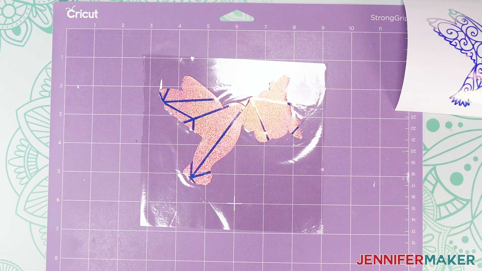 Press the window cling so it is flat on the purple machine mat.