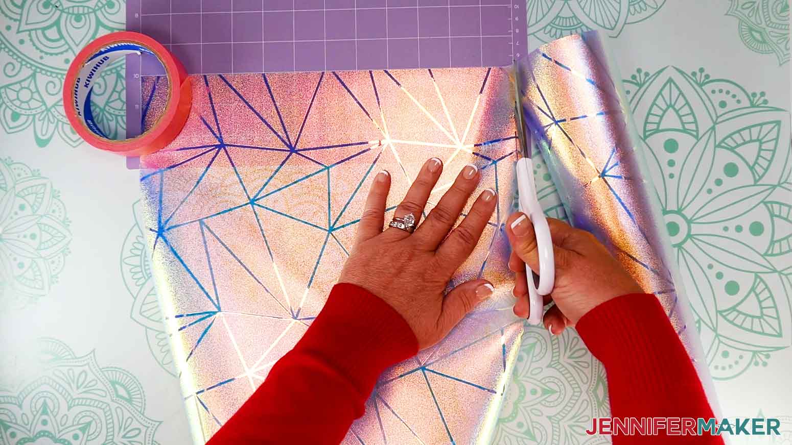 Use scissors to trim the window cling to the size you need.