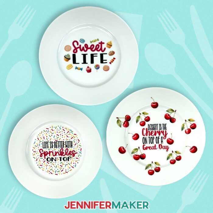 A collection of three waterslide decal-decorated plates with various food designs and cute quotes, from the Waterslide Decals For Beginners tutorial