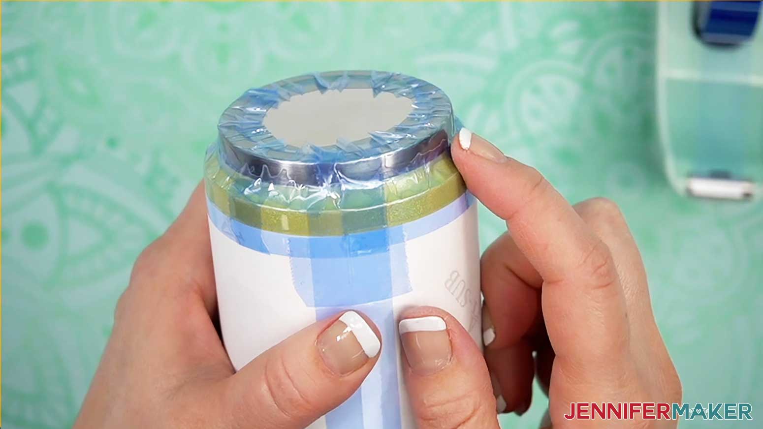 Heat resistant tape covers the bottom of tumbler