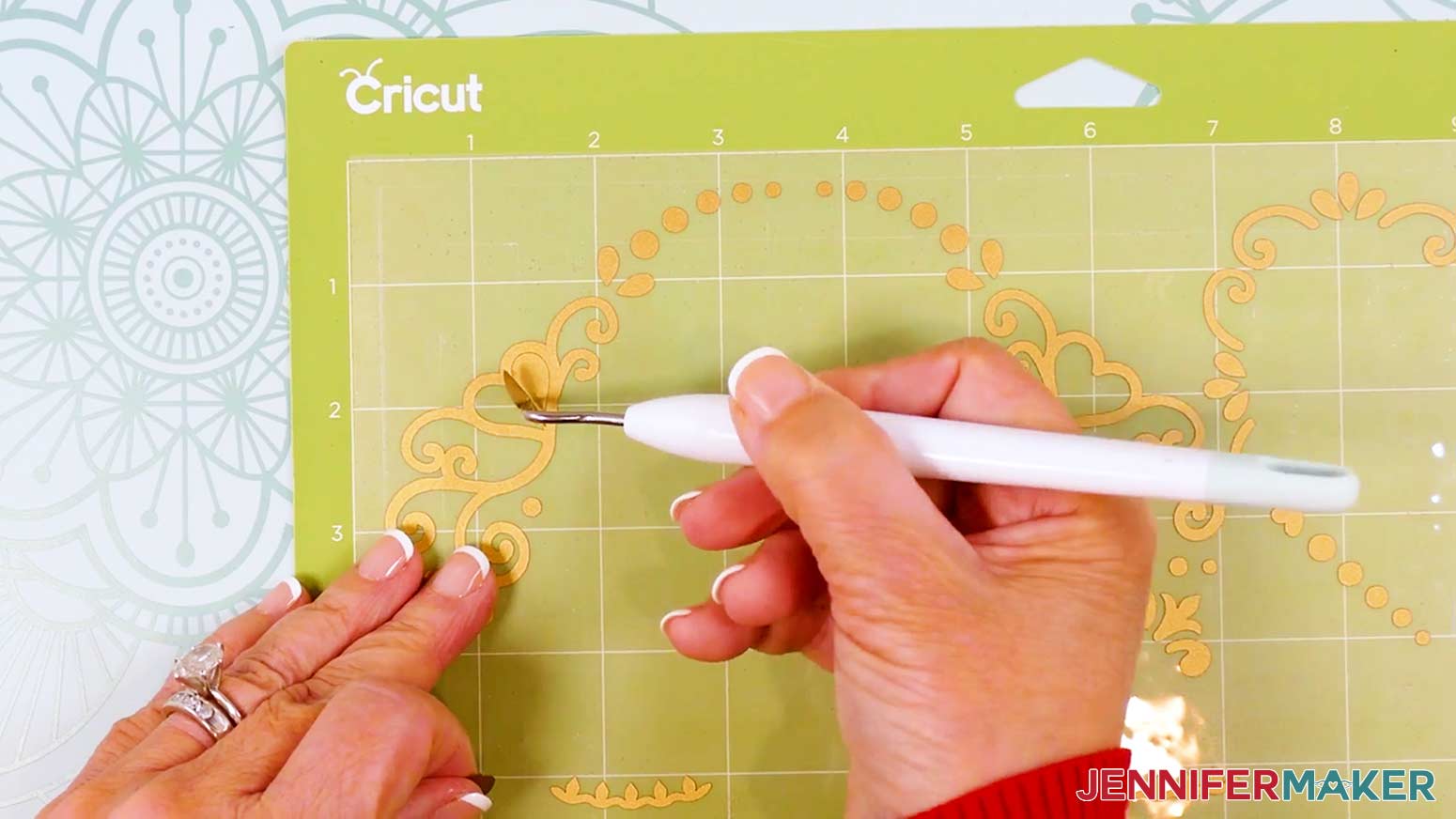 Use a weeding tool to remove smaller sections inside the decals, like the inside of a heart.