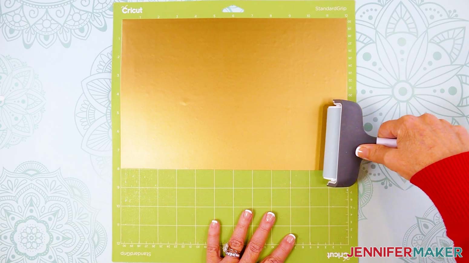Gold value vinyl placed pretty side up on a green StandardGrip machine mat.
