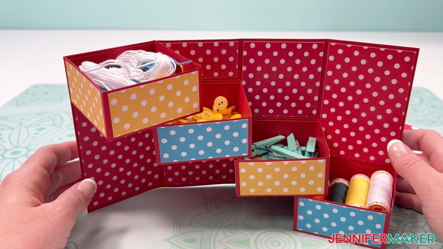 Add items to the drawers in the tower gift box to present as a gift or for storage.