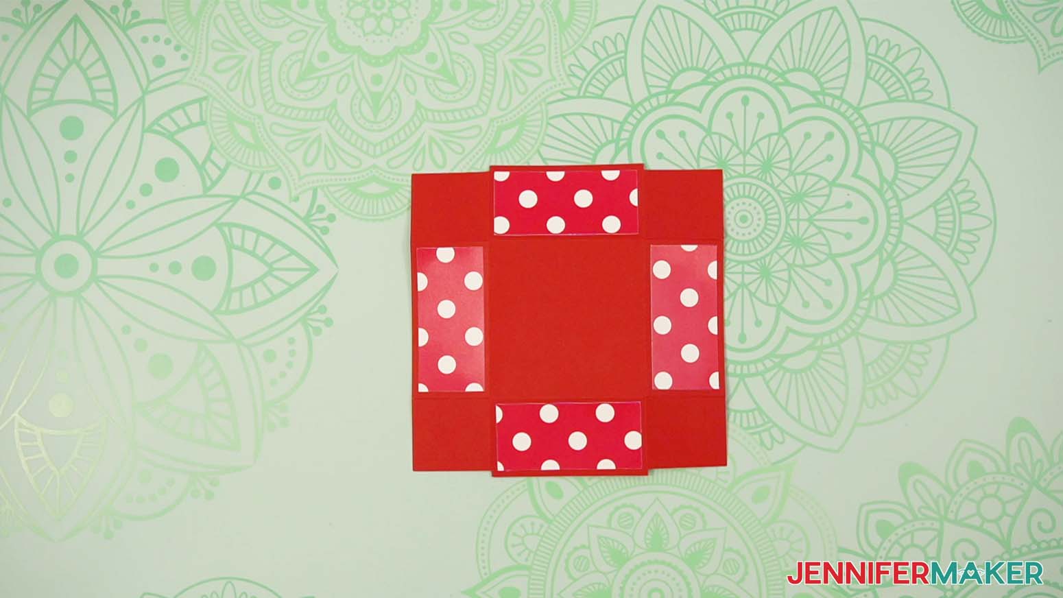 Apply the side panels to the lid piece of the tower gift box.