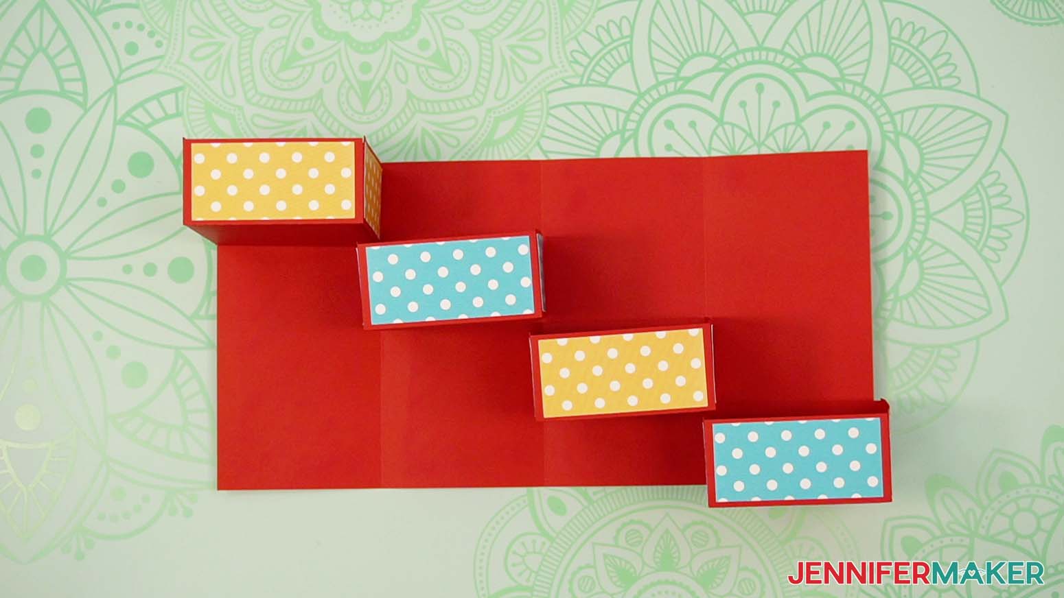 Arrange the drawers in the order they will be glued to the inside of the tower gift box.