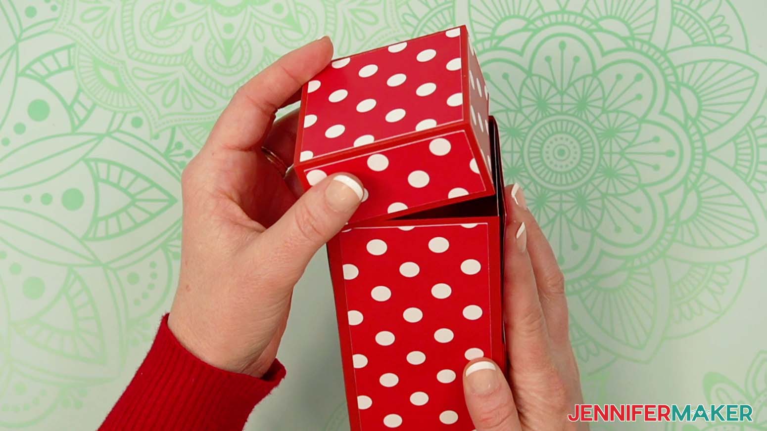 Fit the lid onto the top of the tower gift box.
