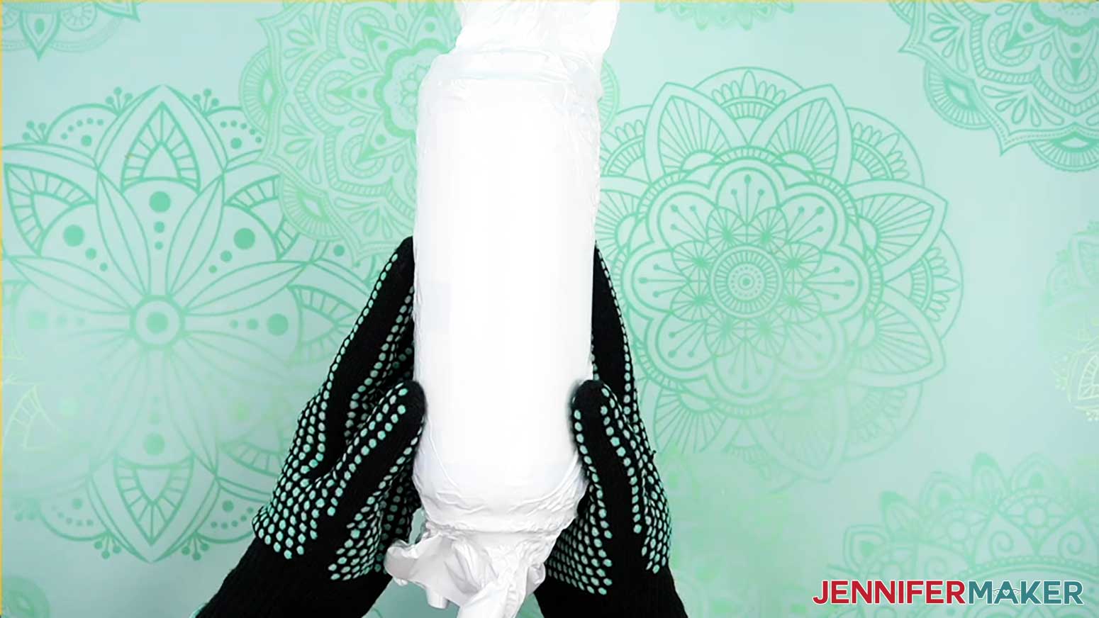 Tumbler with shrink wrap, wear heat resistant gloves