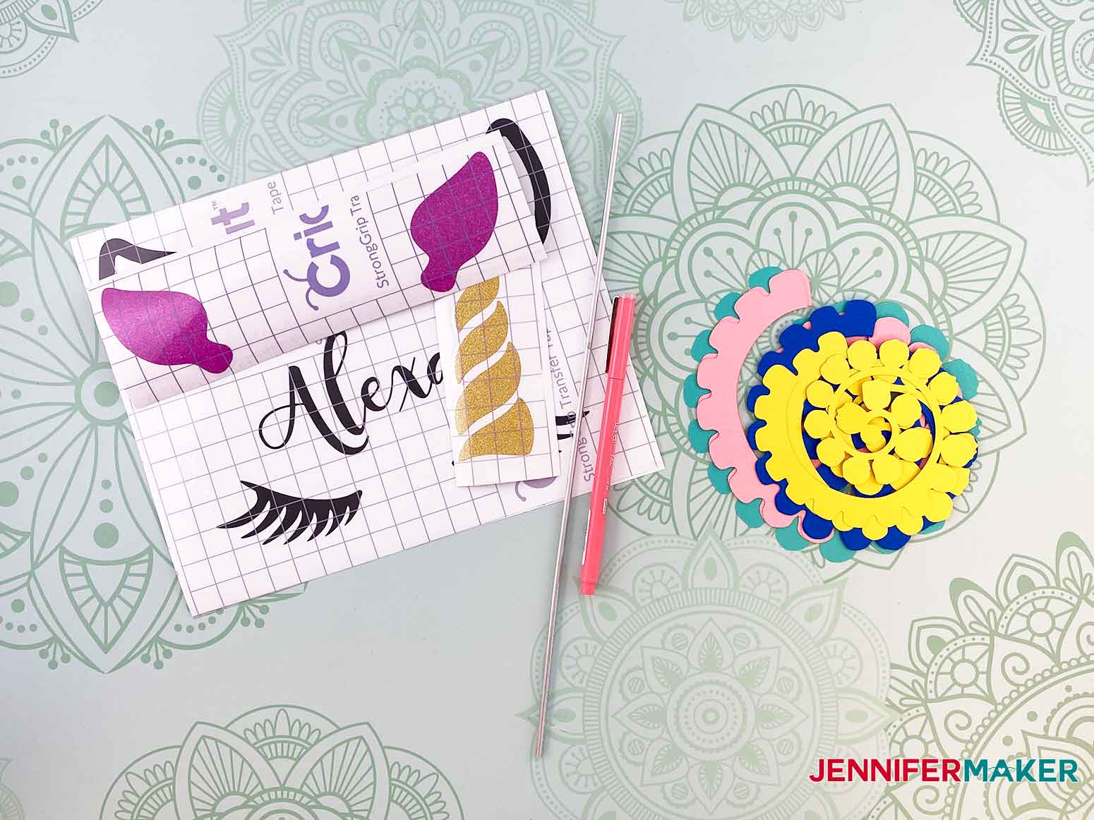 Gather your cut vinyl and paper roses to begin assembling your personalized unicorn frame