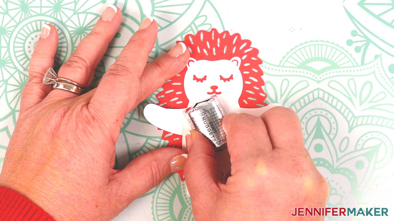 Attach candy with glue dot to the base of the candy hugger.